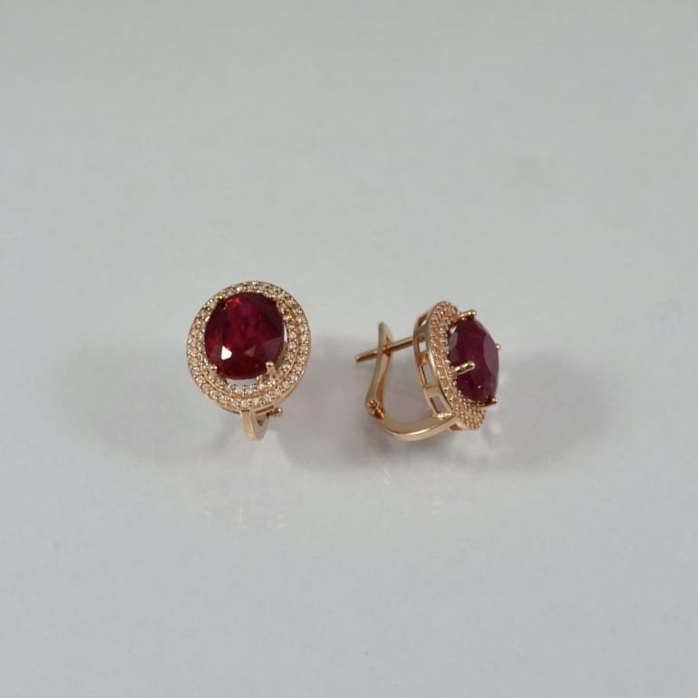 Rose gold earrings with oval ruby and cubic zirconia