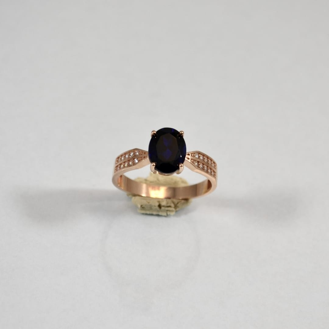 Rose-gold-ring-with-sapphire-and-cubic-zirconia