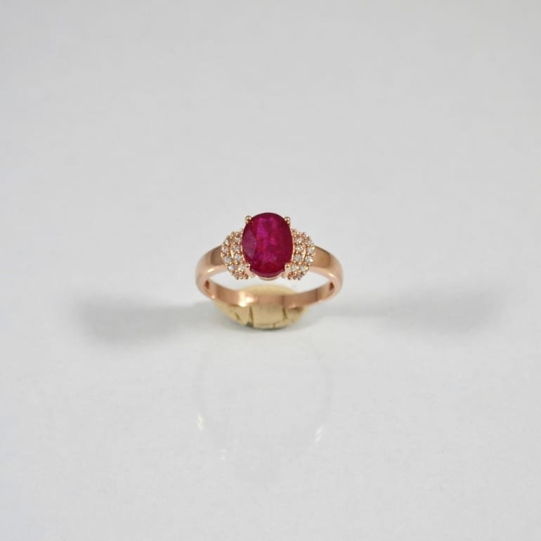 14ct rose gold ring with ruby and cubic zirconia