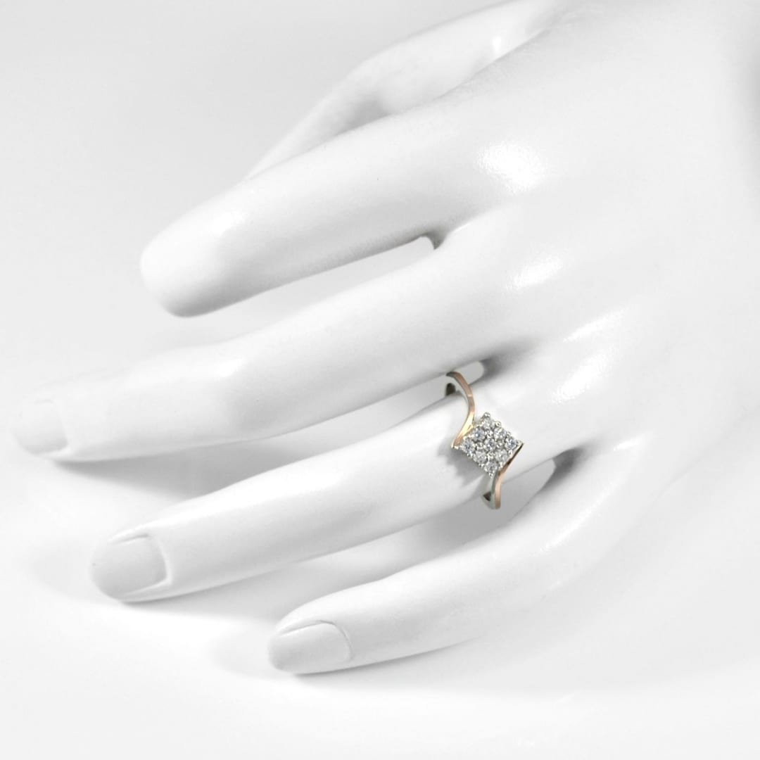 Sterling silver ring with gold plates and white cubic zirconia