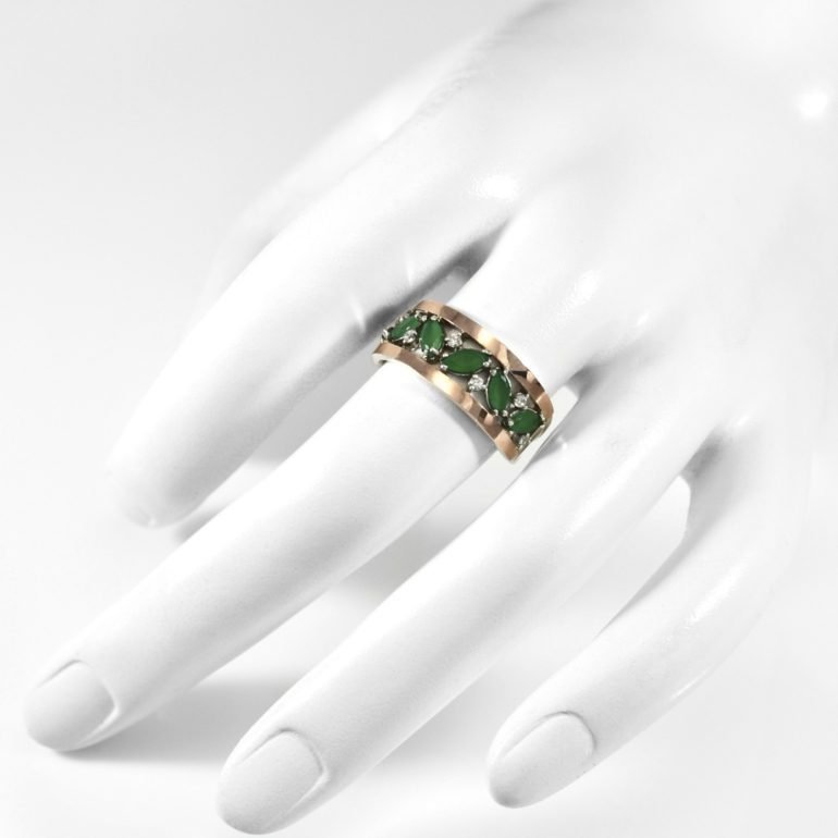 sterling silver ring with gold plates and green cubic zirconia