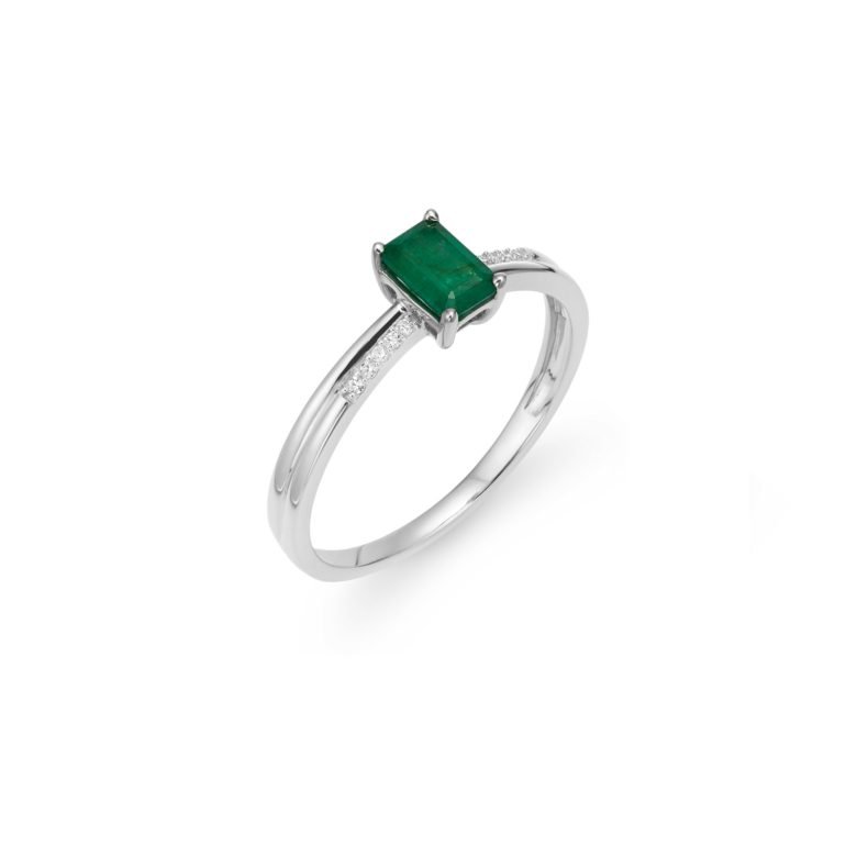 white gold ring with diamonds and emerald
