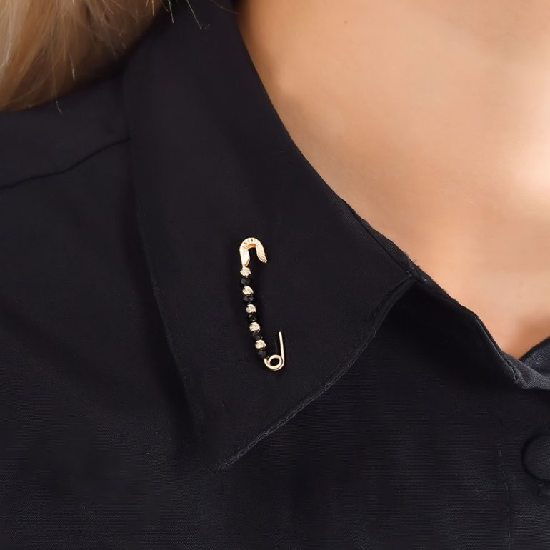 rose gold brooch with onyx