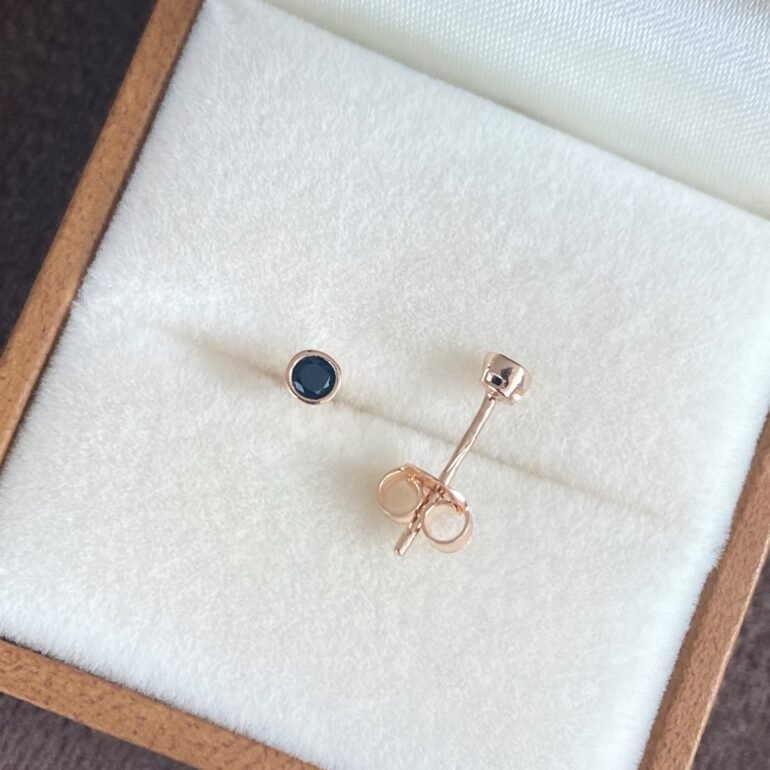 rose gold stud earrings with black cubic zirconia
