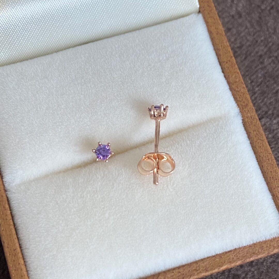 rose gold stud earrings with violet cubic zirconia