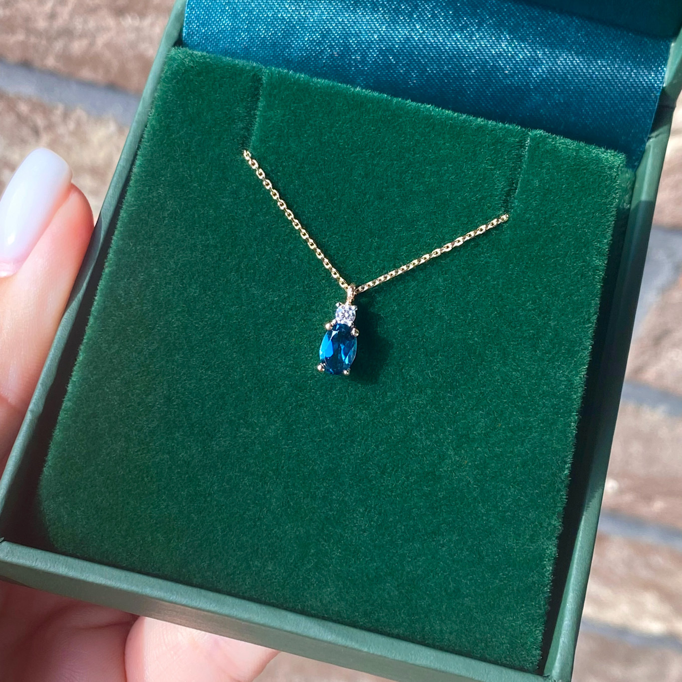 Rose Gold Necklace With London Blue Topaz And Cubic Zirconia