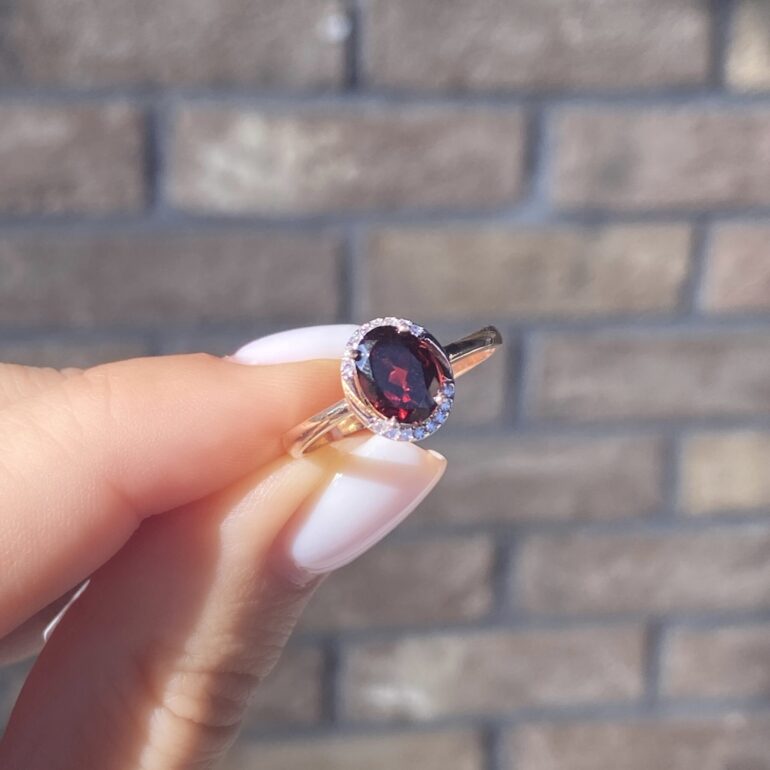 rose gold ring with garnet and cubic zirconia