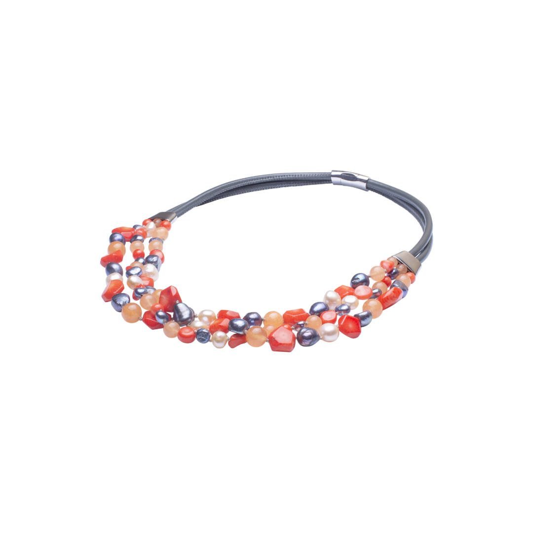 A colourful necklace with pearls, corals and nephrites