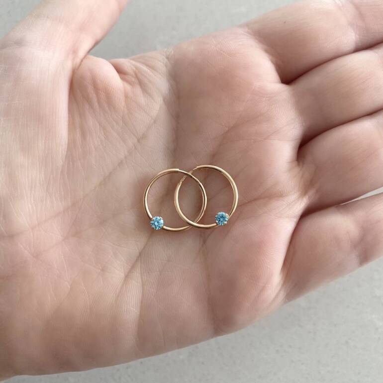 14ct rose gold hoop earrings with light blue cubic zirconia