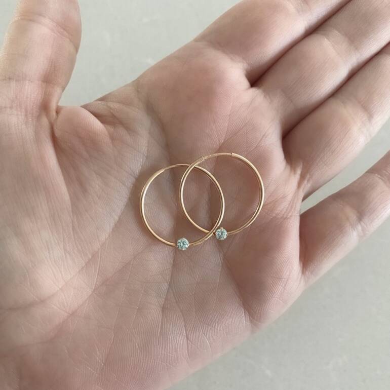 14ct rose gold hoop earrings with light blue cubic zirconia