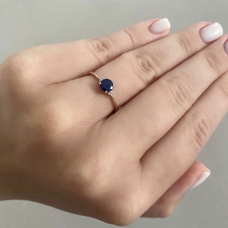 Rose gold ring with sapphire and diamonds