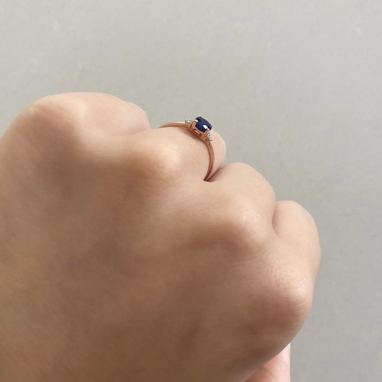 Rose gold ring with sapphire and diamonds