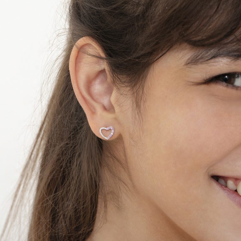 A pair of sterling silver stud earrings with pink cubic zirconia - hearts
