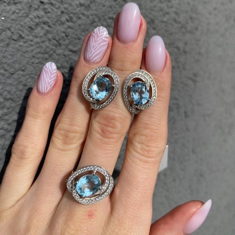 Sterling Silver Ring With Topaz And Fianits