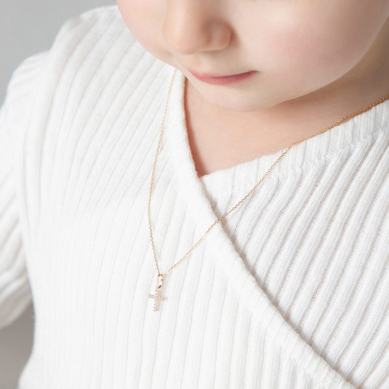 Yellow gold cross pendant necklace