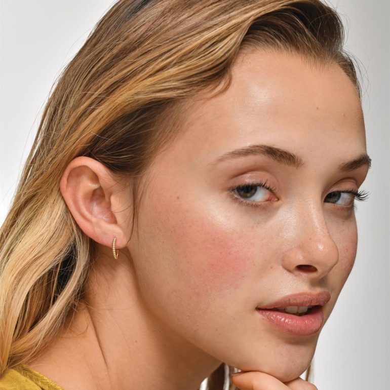 A minimalist rose gold stud earrings