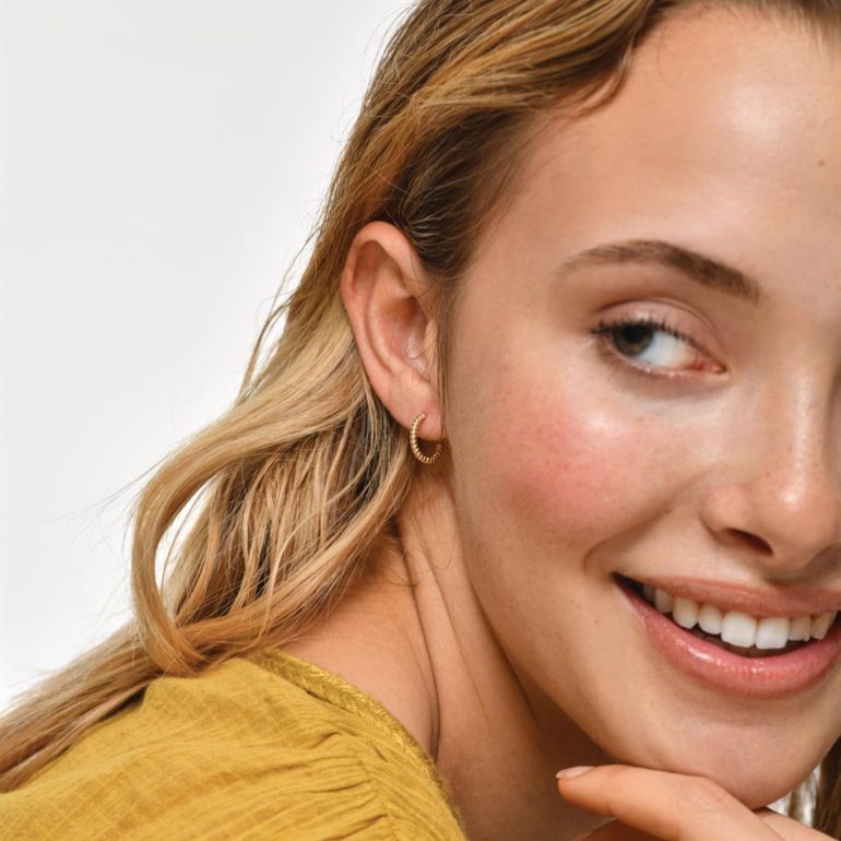 A minimalist rose gold stud earrings