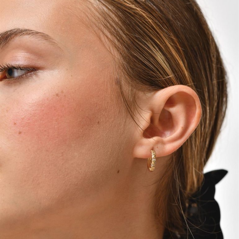 Yellow gold hoop earrings with cubic zirconia