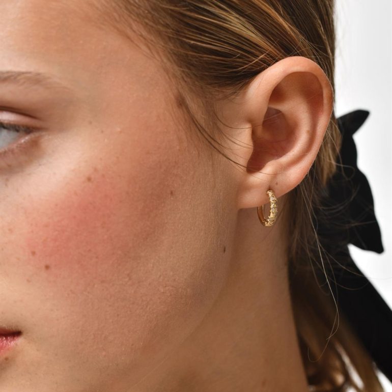 Yellow gold hoop earrings with cubic zirconia