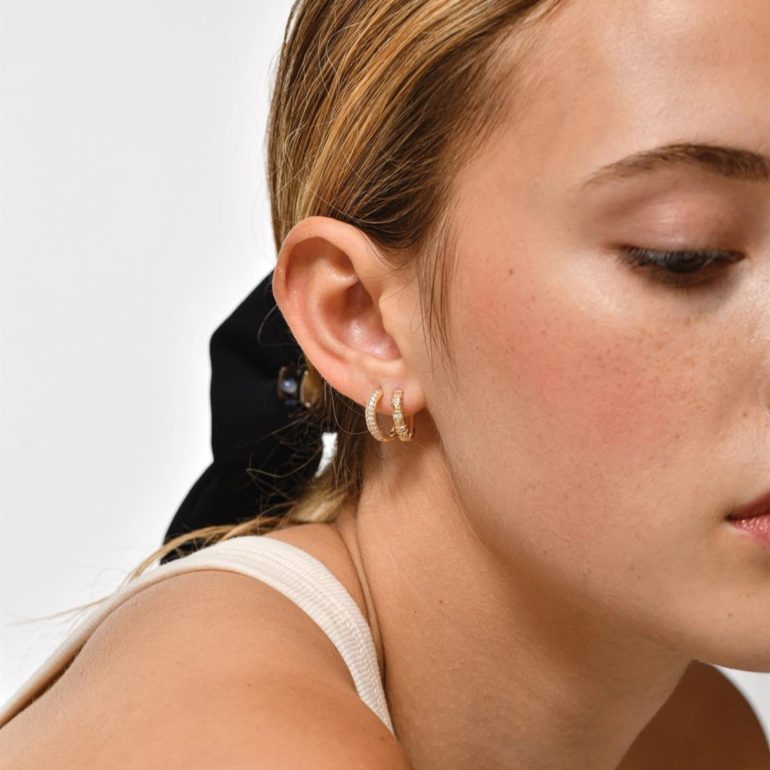 Yellow gold hoop earrings with cubic zirconia