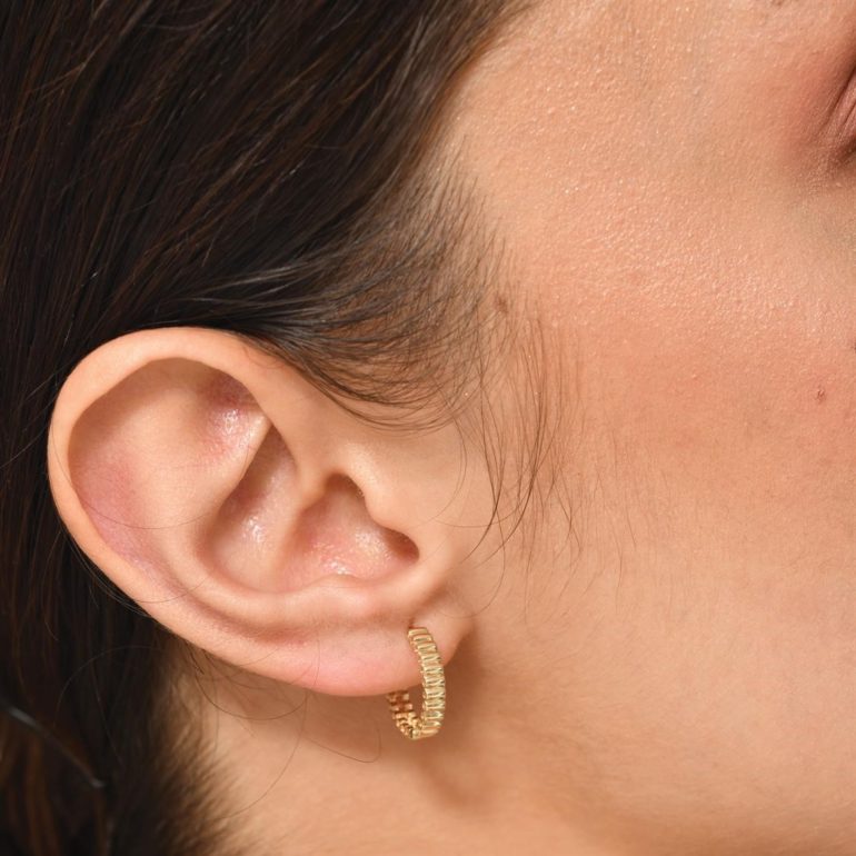 Yellow gold hoop earrings with cubic zirconia