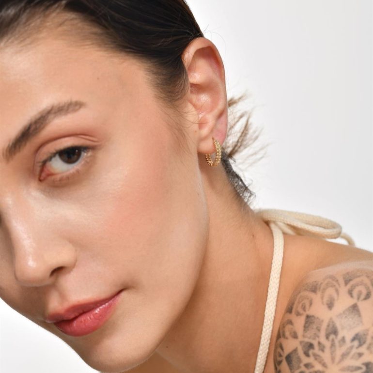 Yellow gold hoop earrings with cubic zirconia