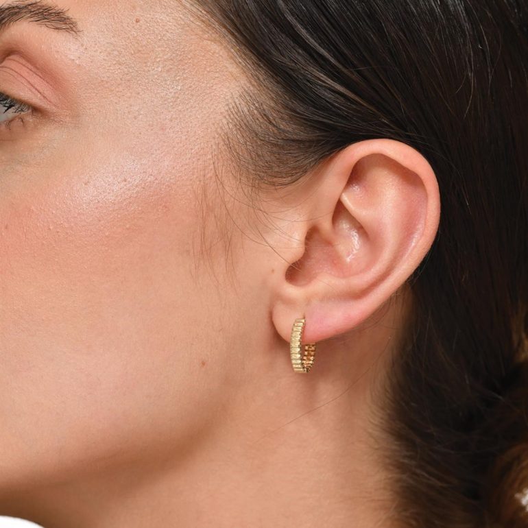 Yellow gold hoop earrings with cubic zirconia