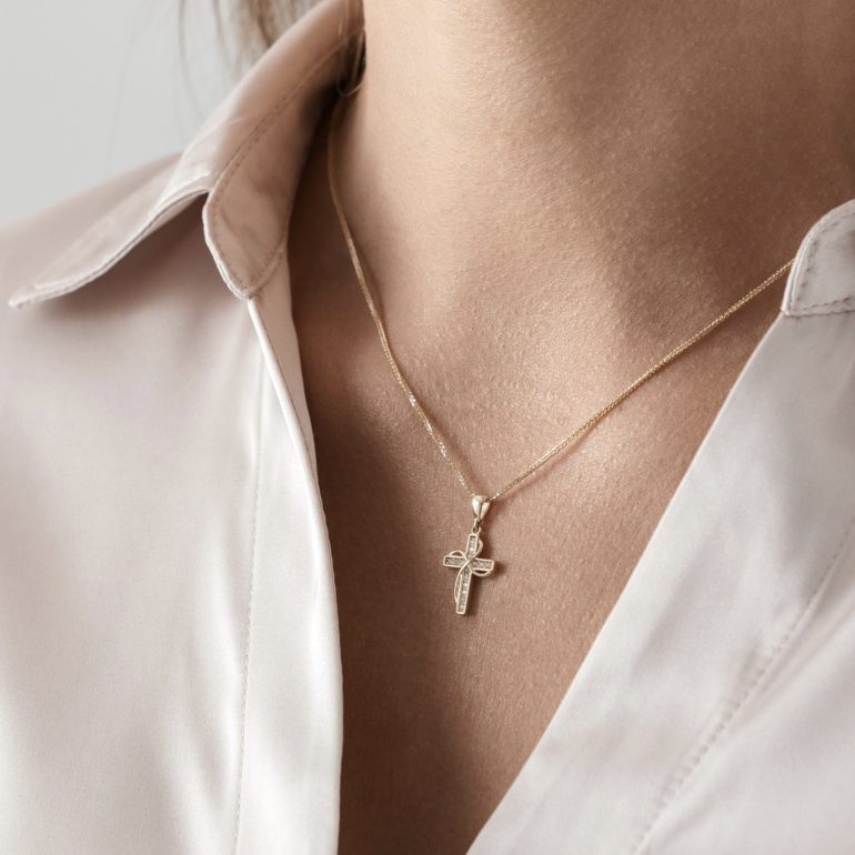 Yellow gold cross pendant with cubic zirconia