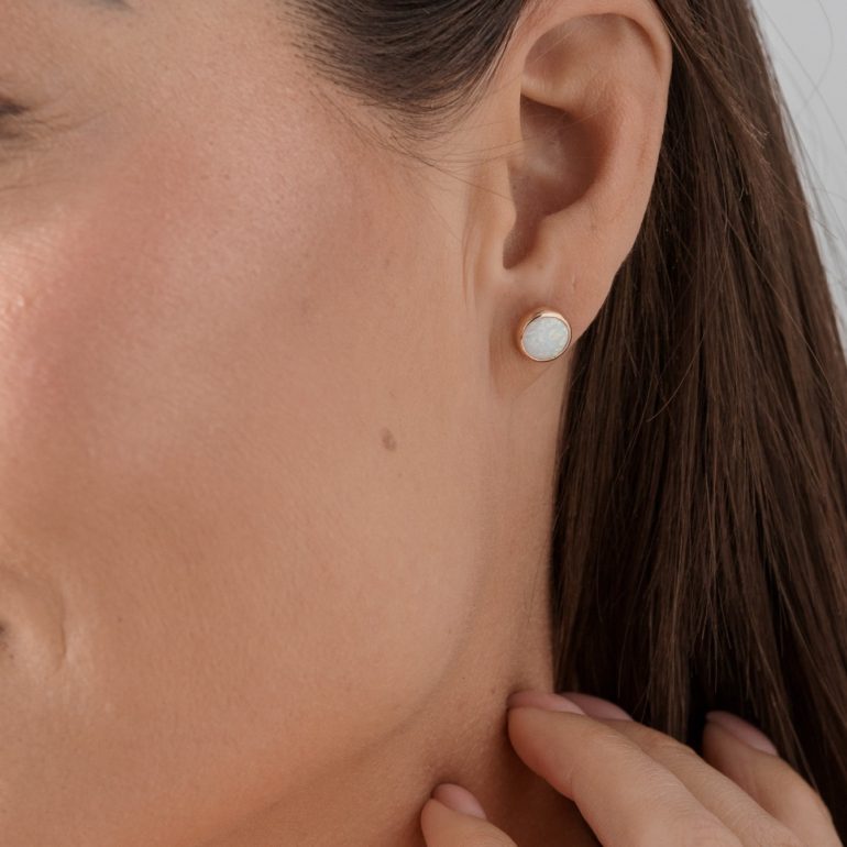 Rose gold stud earrings with opal