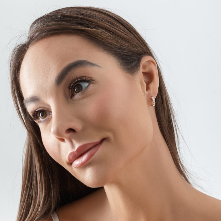 Golden hoop earrings with cubic zirconia