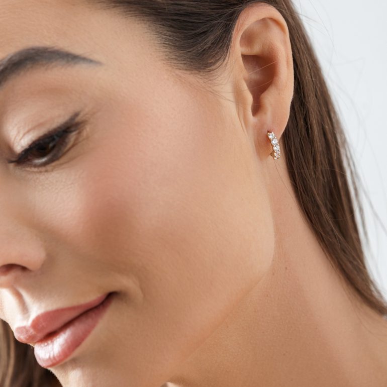 Golden hoop earrings with cubic zirconia