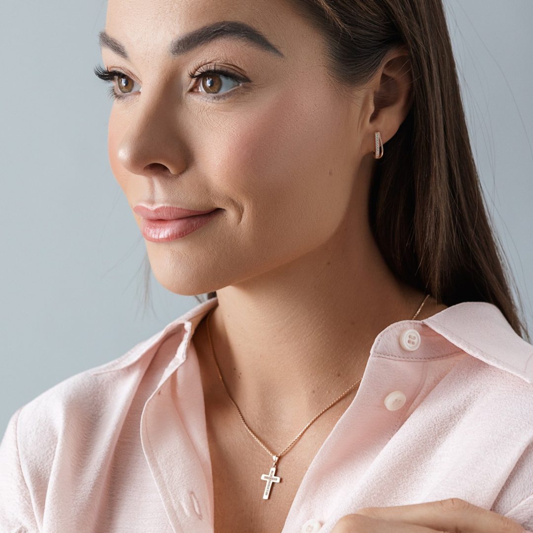 Rose gold cross pendant with cubic zirconia