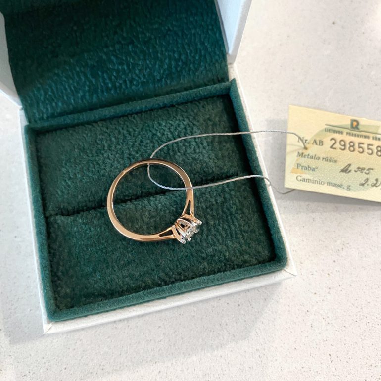 A luxurious 14ct rose gold engagement ring with diamond