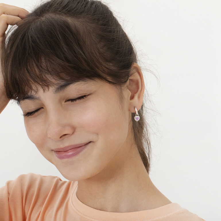 Sterling silver hoop earrings with dandling heart