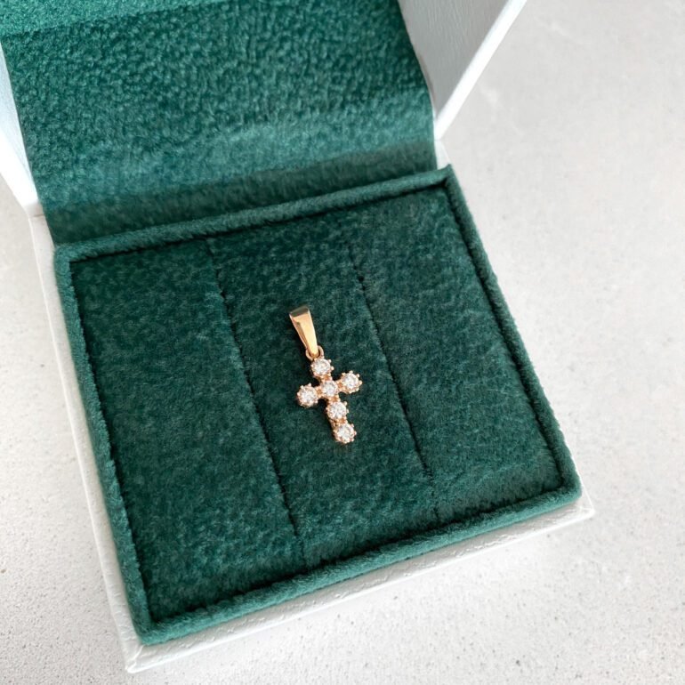 Rose gold cross pendant with cubic zirconia