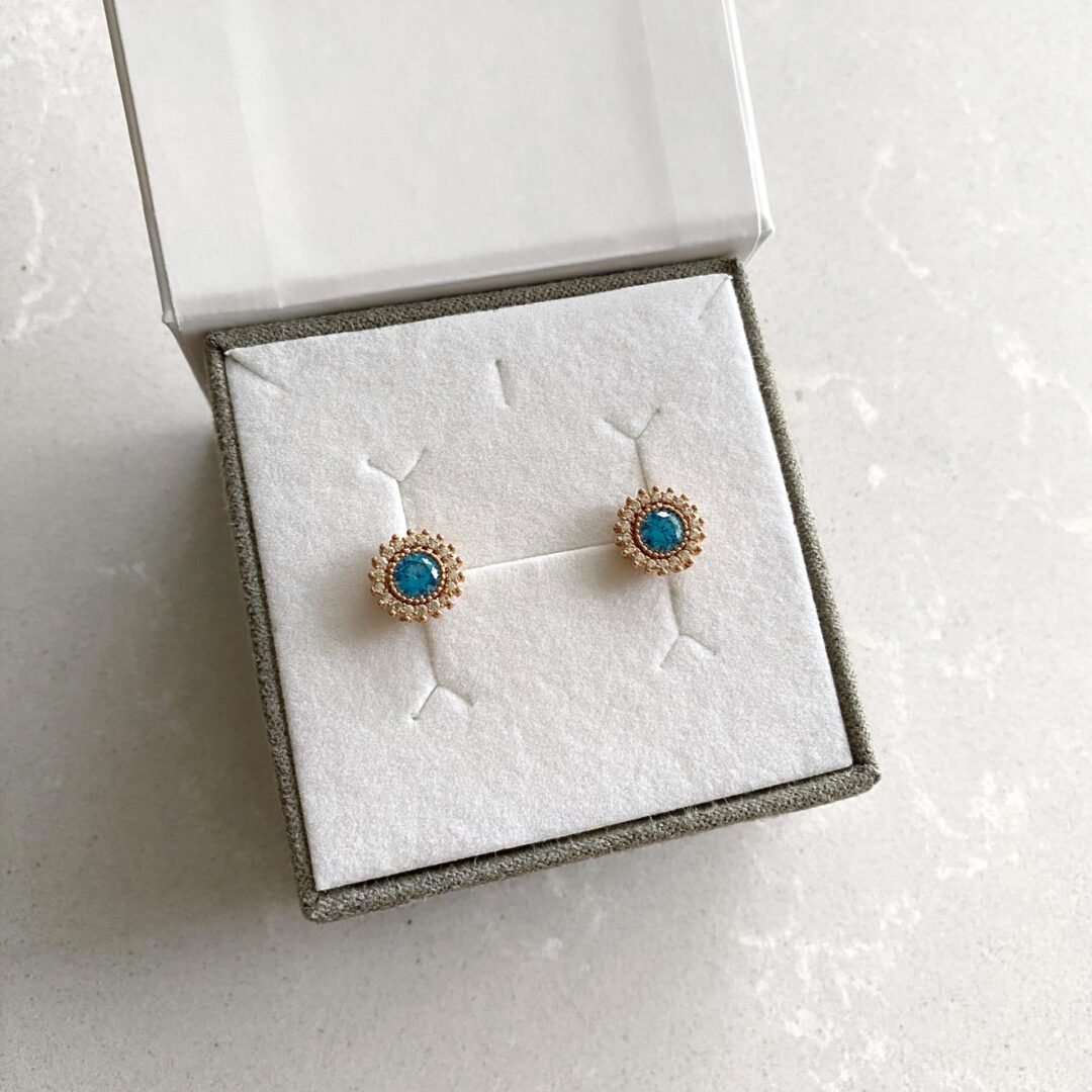 Rose gold stud earrings with topaz and cubic zirconia