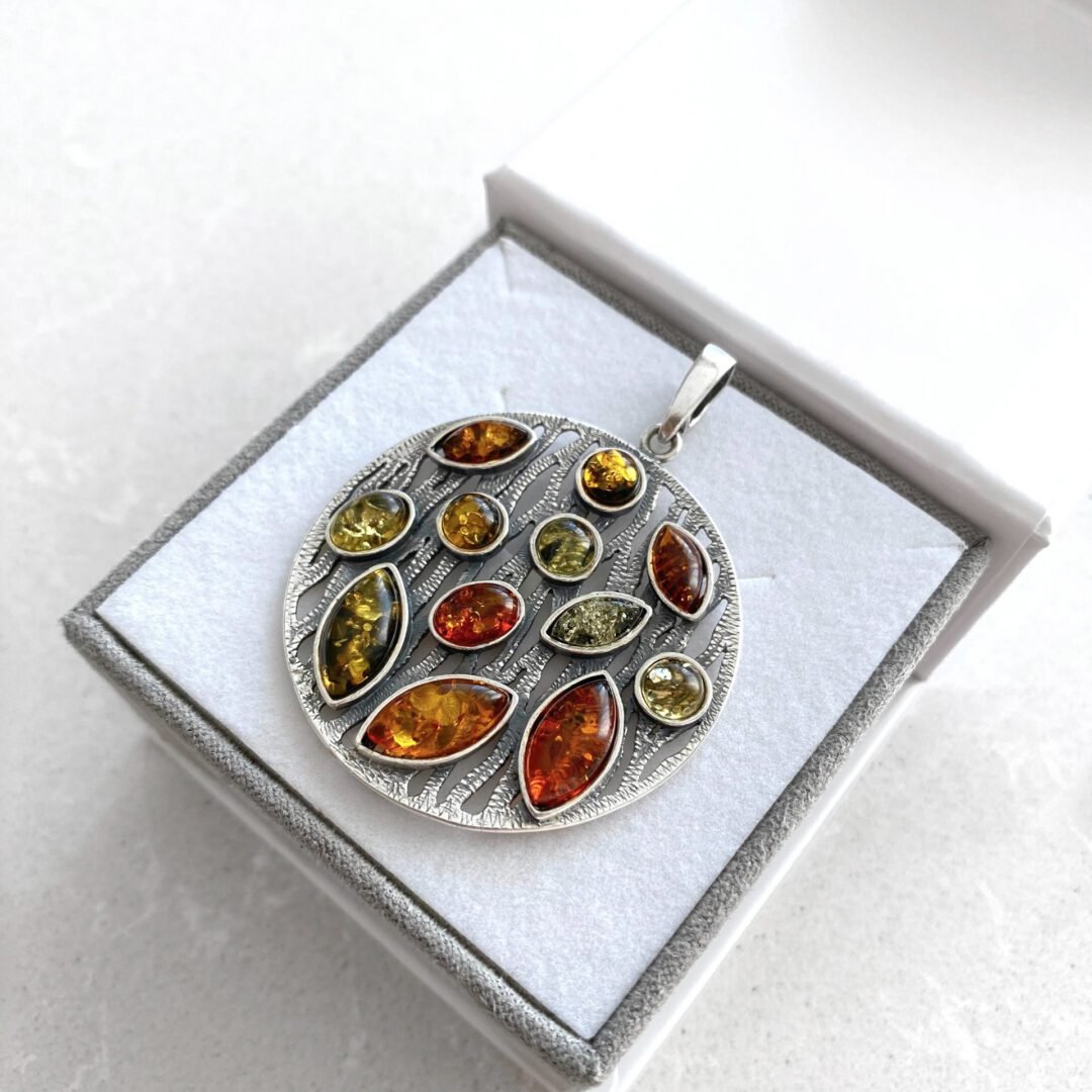 Sterling silver pendant with amber