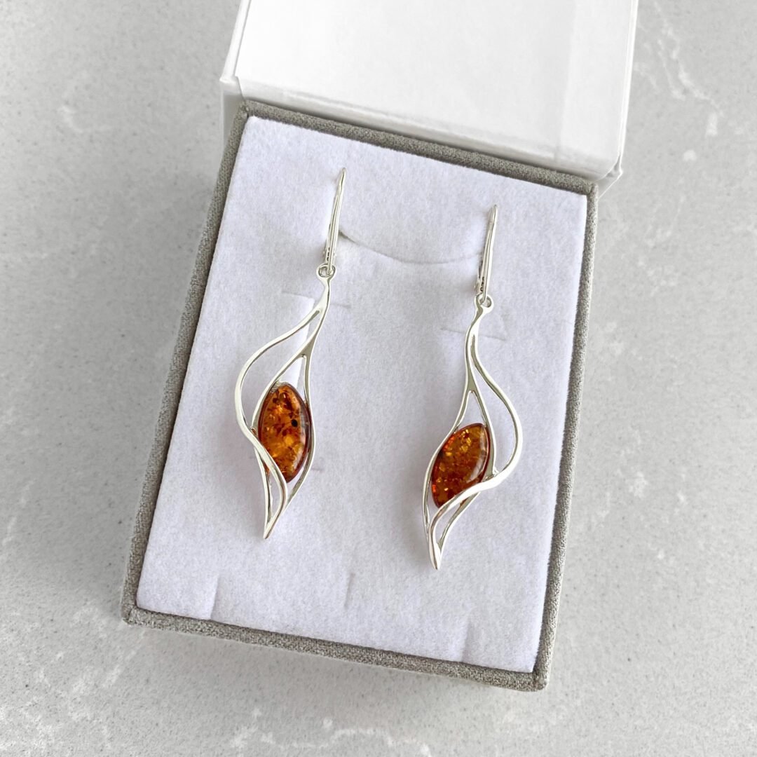 Sterling silver dandling earrings with amber