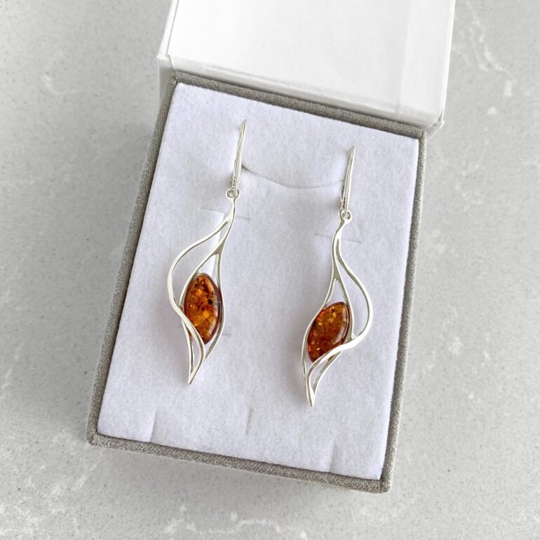 Sterling silver dandling earrings with amber