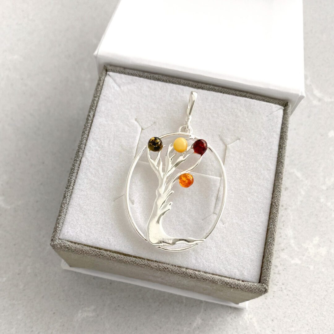 Sterling silver pendant with amber