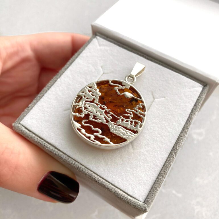 Sterling silver pendant with amber