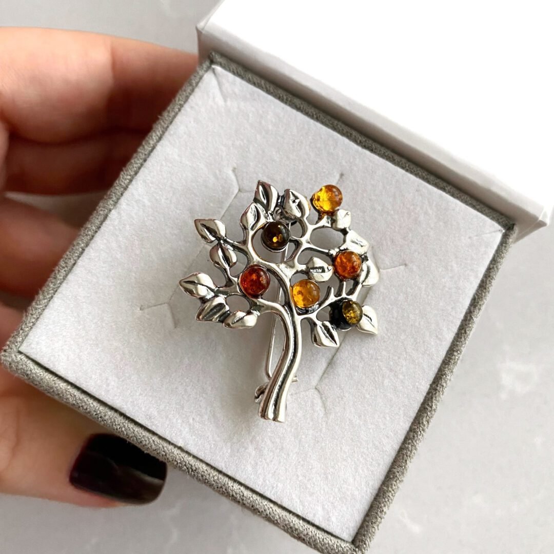 Sterling silver brooch with amber