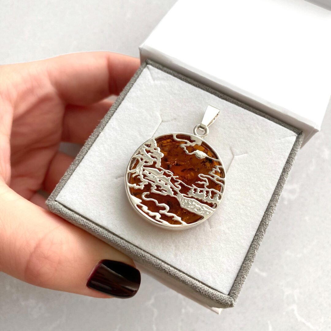 Sterling silver pendant with amber