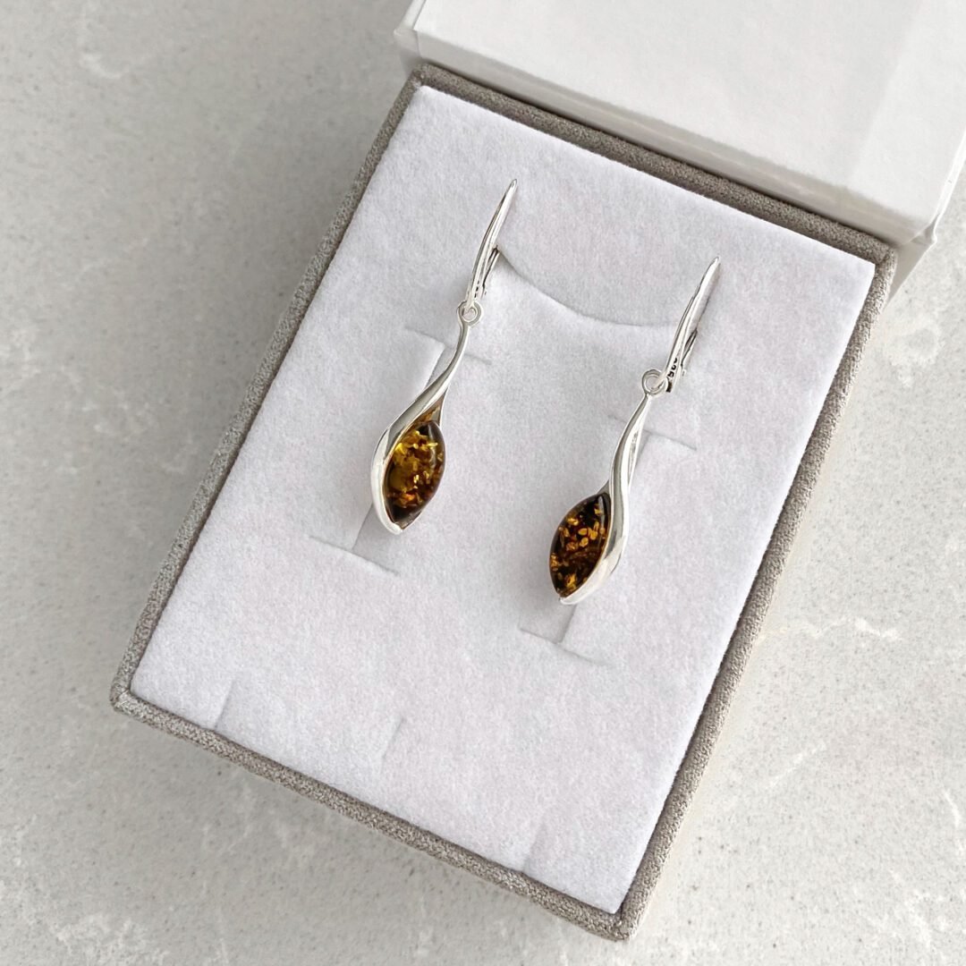 Sterling silver dandling earrings with amber