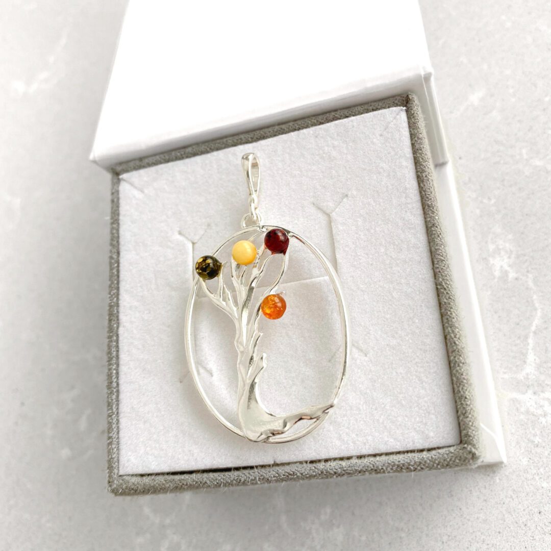 Sterling silver pendant with amber