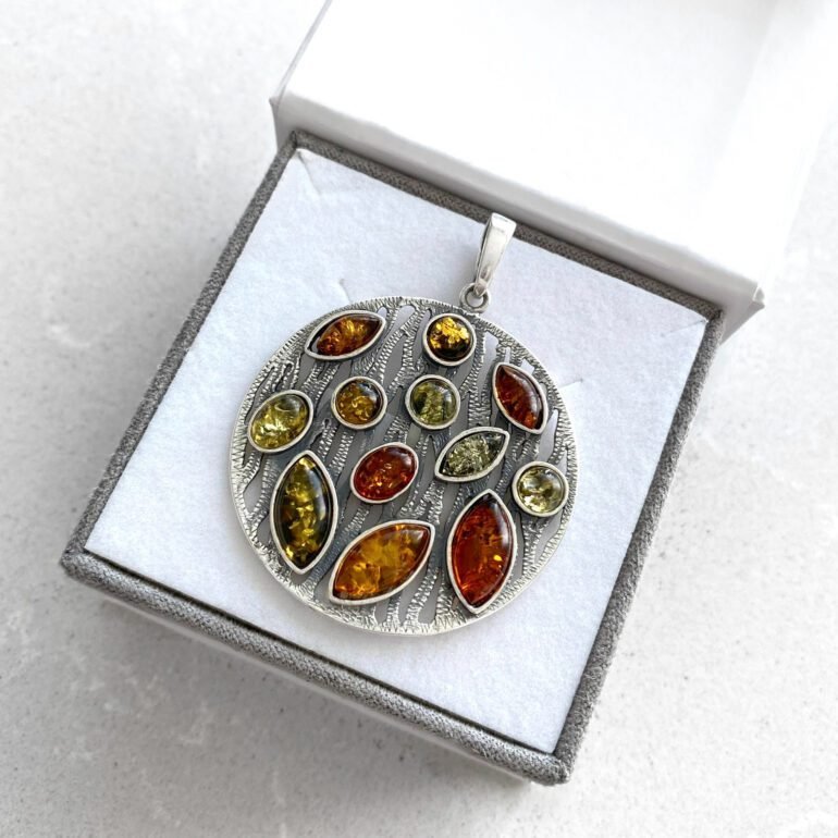 Sterling silver pendant with amber