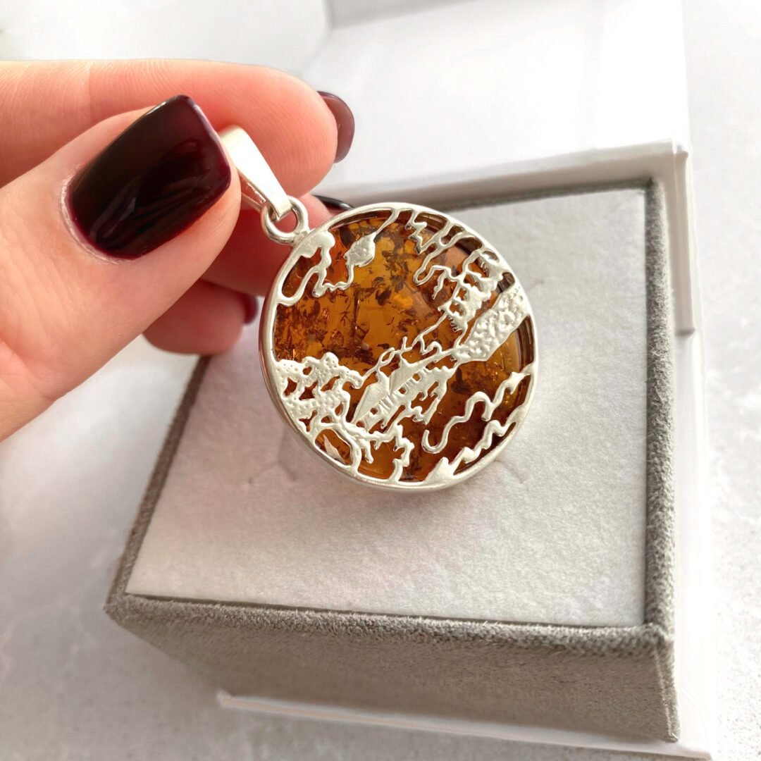 Sterling silver pendant with amber