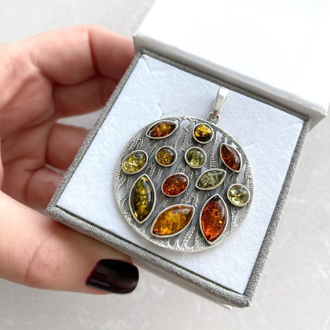 Sterling silver pendant with amber