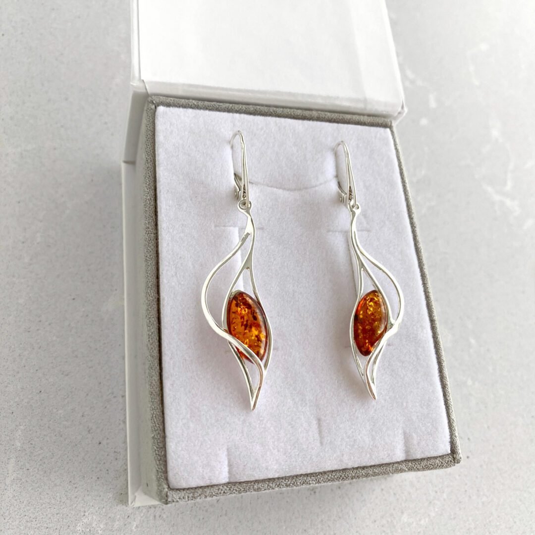 Sterling silver dandling earrings with amber