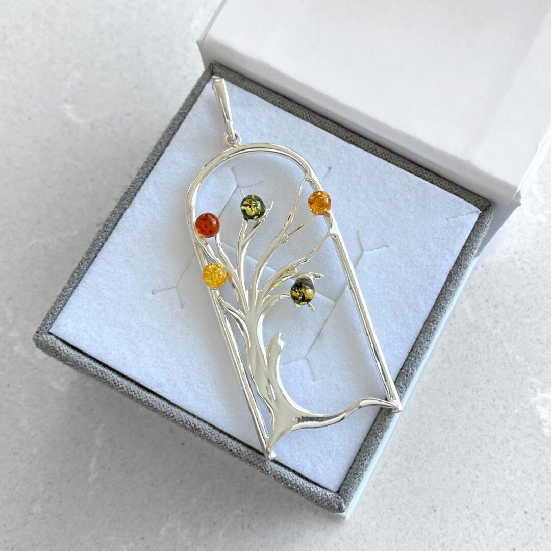 Sterling silver pendant with amber